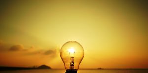 Light Bulbs Over Arched Horizon  Clouds and Sky.