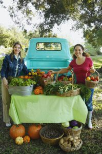 Hispanic women at organic farm stand